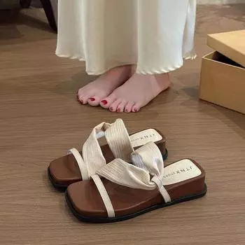 Wedge heel slippers women s summer wear new one-word drag holiday with skirt thick-soled cool slippers 35