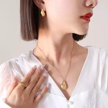 Wind Personality Универсальный титановый стальной покрытый 18-каратным золотом кулон в форме ожерелья серьги комплект ювелирных изделий