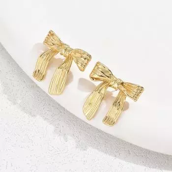 Wind wave bow earrings personality irregular niche design thread earrings Internet celebrity versatile earrings 14k