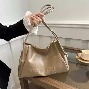 Женская сумка нишевый дизайн ранняя весна новая текстура облако сумка-тоут простая сумка подмышки сумка-тоут для поездок на работу прилив чёрный