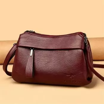 Women s Black Crossbody Bag with Embossed Kangaroo Logo Three Main Compartments Leather Shoulder Bag