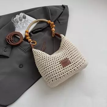 Woven bag women s autumn new fashion hollow knitted shoulder bag large capacity commuter bucket bag