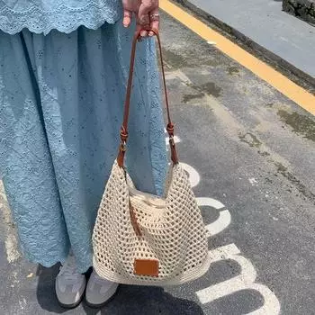 Woven Hollow Bag Women 2025 New Summer Seaside Vacation Travel Tote Bag Beach Bag Shoulder Underarm Bag Light beige