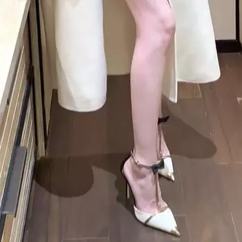 Xiaoxue Internet celebrity with the same pointed bow high heels women s stiletto one word with bag head sandals beautiful fairy shoes 35