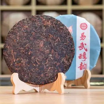 Yiwu алкогольный стишок чай пуэр выдержанный чай семь семян пирога Юньнань старое дерево выдержанный чай пуэр 357g