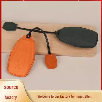 Замшевый чехол и цепочка для ключей Geely Emgrand, Binyue, Xingyue L, Xingrui, Boyue, Binrui оранжевый