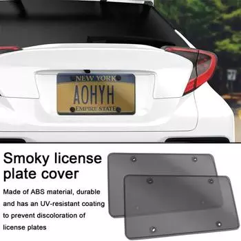 Защитная крышка автомобильного номерного знака с комплектом винтов. Устойчивая к ультрафиолетовому излучению, небьющаяся, простая в установке, универсальная защита номерного знака. чёрный