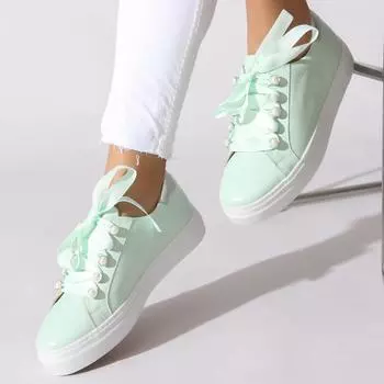 Зеленые женские кроссовки из натуральной кожи