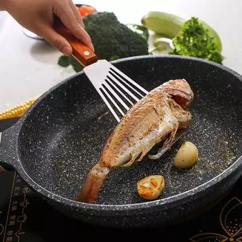 Жаростойкий шпатель из нержавеющей стали с полой структурой. Практичная веерообразная кухонная лопатка. Инструмент для приготовления пищи.