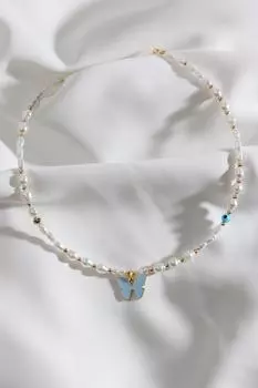 Жемчужное ожерелье с подвеской в виде синей бабочки