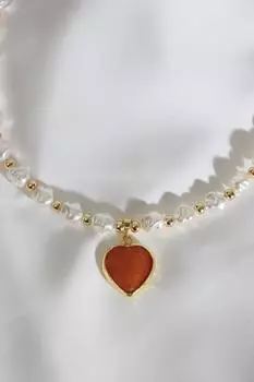 Жемчужное ожерелье с сердечком оранжевого цвета