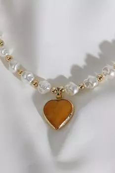 Жемчужное ожерелье желтого цвета с сердечком и жемчугом