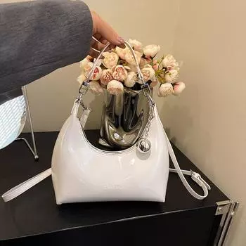 Женская модная сумка класса люкс осень 2025: Дизайн сумки-мессенджера, сумки-мессенджера, сумки для поездок на работу, сумки-пельмени для переноски в руках 21x8x20 cm чёрный