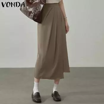 Женская однотонная длинная полуюбка VONDA с неровным подолом и плиссировкой 5XL жёлтый