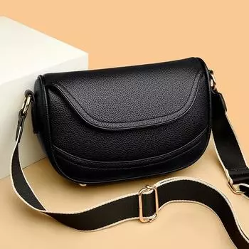 Женская сумка элитного и нишевого дизайна, седельная сумка. Новая универсальная маленькая сумка из мягкой кожи 2024 года, широкий плечевой ремень, сумка через плечо на одно плечо.