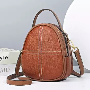 Женская сумка из кожи Oblique Span, маленькая круглая сумка, модная и эффектная, сумка для мобильного телефона из коровьей кожи первого слоя, на одно плечо. светло-коричневого