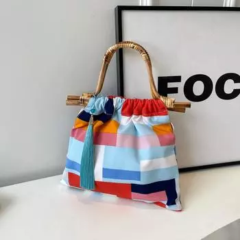 Женская сумочка из разноцветного лоскутного материала, все женщины используют ее для повышения темперамента, для удовлетворения повседневных потребностей.