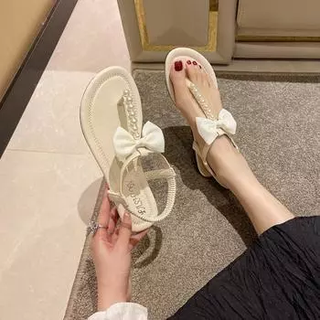 Женские босоножки Temperament 2024 года, летние новые женские шлепанцы с жемчугом, пляжные, плоские, на открытом воздухе, противоскользящие, с бантом, одинарные туфли 35 бежевый