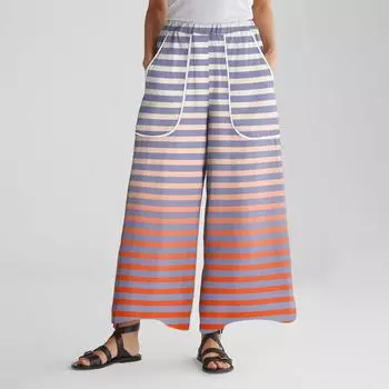 Женские брюки широкие от бедра с эластичным поясом, с принтом, с большими карманами, с отделкой пэчворк по краю, свободные M