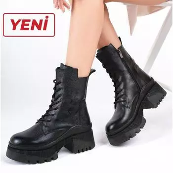 Женские кожаные ботинки черного цвета из натуральной кожи с зубчатой подошвой на платформе