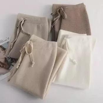 Женские мягкие шерстяные брюки широкого кроя на осень/зиму - белые драпированные трикотажные модели Medium белый