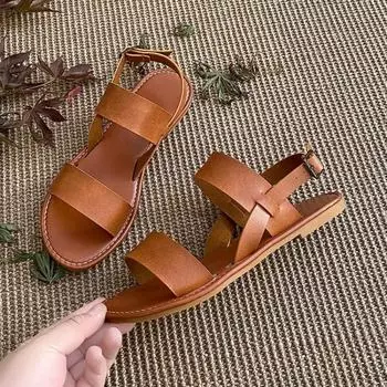 Женские сандалии на плоской подошве 2024 года, новые кожаные с перекрестными ремешками из Европы и Америки, высококачественные летние женские туфли, пляжные сандалии с пряжкой и ремешком 35 чёрный