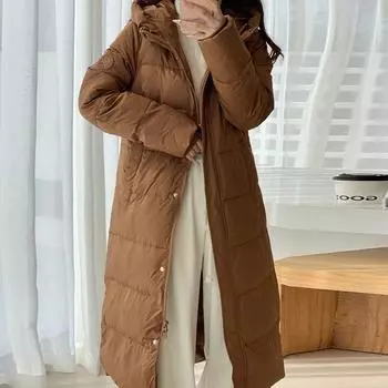 Женские средние и длинные пуховики простые и утепленные, а также длинные куртки из белого утиного пуха длиной выше колена. S