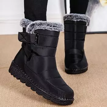 Женские зимние водонепроницаемые ботинки 2024 года из хлопка с плоской подошвой, теплые ботинки с европейской и американской наклонной платформой и каблуком 36 чёрный