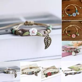 Женский браслет ручной работы Плетеные тканые керамические бусины Полый лист Этнический стиль Подарок Регулируемый цветок Очарование Студенты Браслет Веревка Модные украшения красный