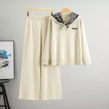 Женский комплект из двух предметов, состоящий из повседневного свитера с круглым вырезом, длинными рукавами и свободной вязки, и брюк с высокой посадкой и широкими штанинами. one size