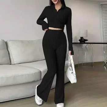 Женский модный однотонный ребристый костюм из двух частей с застежкой-молнией, коротким топом с длинными рукавами и расклешенными брюками с высокой талией L чёрный