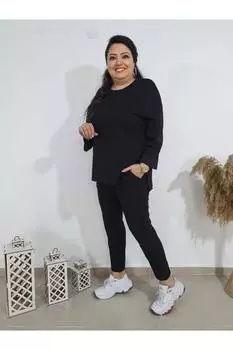 Женский модный спортивный костюм большого размера. Стильный костюм большого размера с разрезами по бокам.