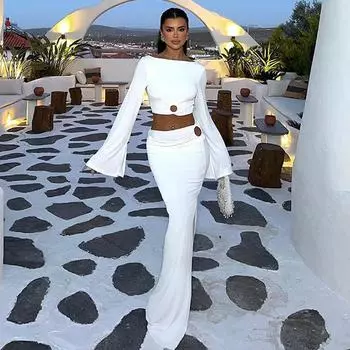 Женский осенний сексуальный узкий расклешенный топ с бретельками через шею и открытой юбкой S чёрный