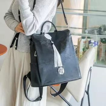 Женский ретро мягкий кожаный рюкзак с кисточками большой емкости дорожная сумка чёрный