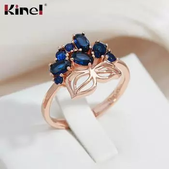 Женское обручальное кольцо Kinel с синим кристаллом и цветком 7 розового золота