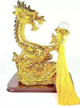 Золотая статуэтка восходящего дракона с хрустальным шаром. Удачи, сильной удачи.