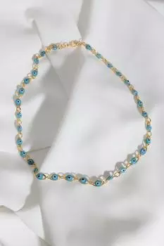 Золотое колье с глазами-капельками