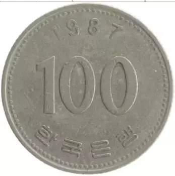 Монета 100 вон Южной Кореи 1987 года Медно-никель