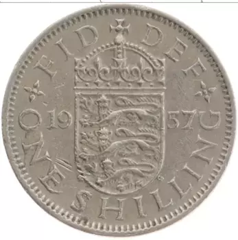 Монета шиллинг Англии 1957 года Медно-никель