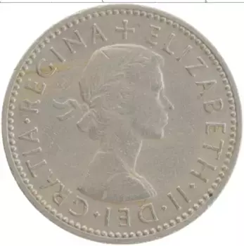 Монета шиллинг Англии 1958 года Медно-никель Елизавета II