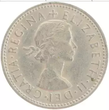 Монета шиллинг Англии 1961 года Медно-никель Елизавета II