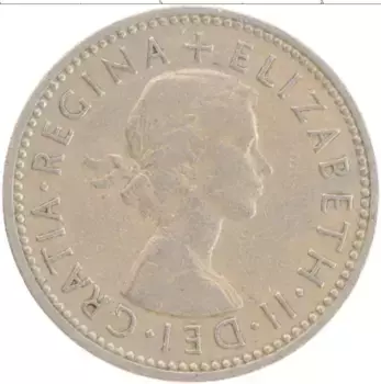 Монета шиллинг Англии 1962 года Медно-никель Елизавета II