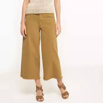 Брюки широкие, низ с бахромой