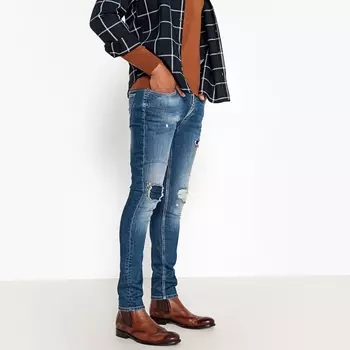 Джинсы узкого покроя с рваным эффектом