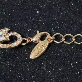 Браслет со стразами "Цветущая ветвь" лепестки, цвет бензиновый в золоте