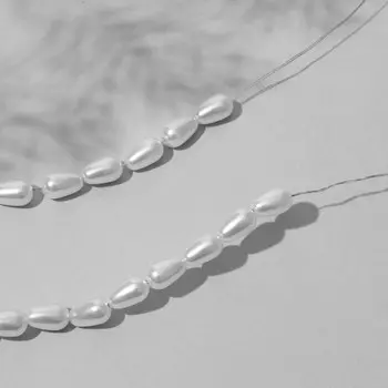 Бусины пластиковые на нити «Жемчуг», капля 0.80.40.4 см, набор 110 шт, цвет белый
