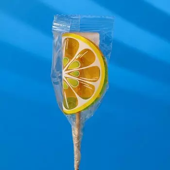 Карамель на палочке "Фруктовый джус" 16г Лимон