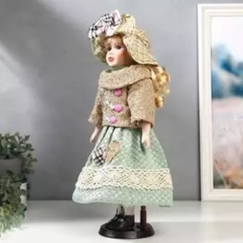 Кукла коллекционная керамика "Блондинка с кудрями, в зелёном свитере с тесьмой" 40 см