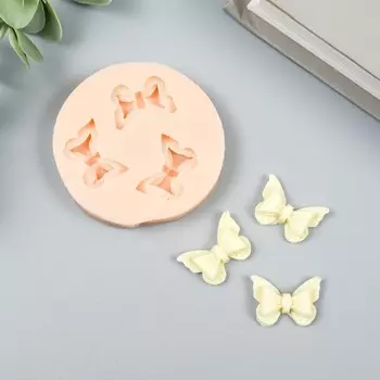 Молд силиконовый "Три бантика" 2,2х1,5 см