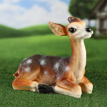 Садовая фигура "Олень лежит" 30х34х20см